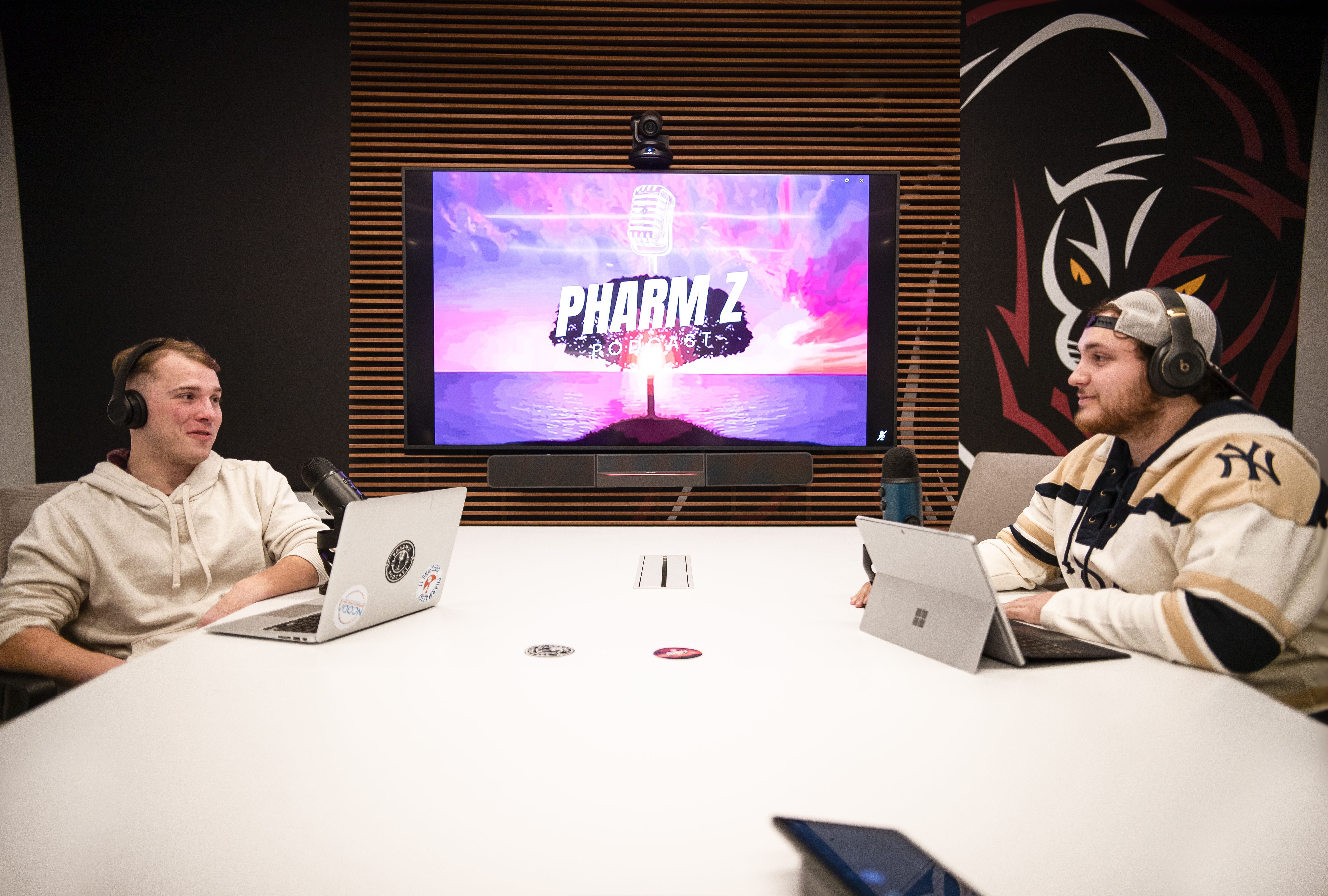 Austin Lewerk (left) and Dylan Knapp create the PharmZ podcast, in the Panther's Den conference room