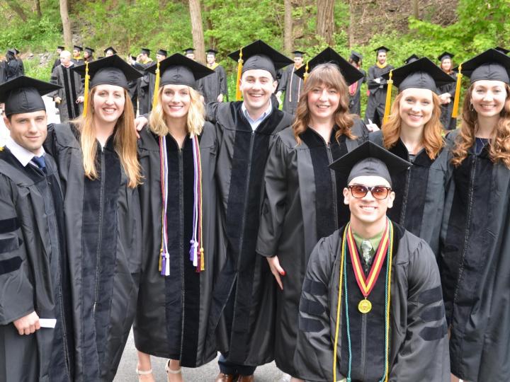 students in cap and gown at ACPHS commencement