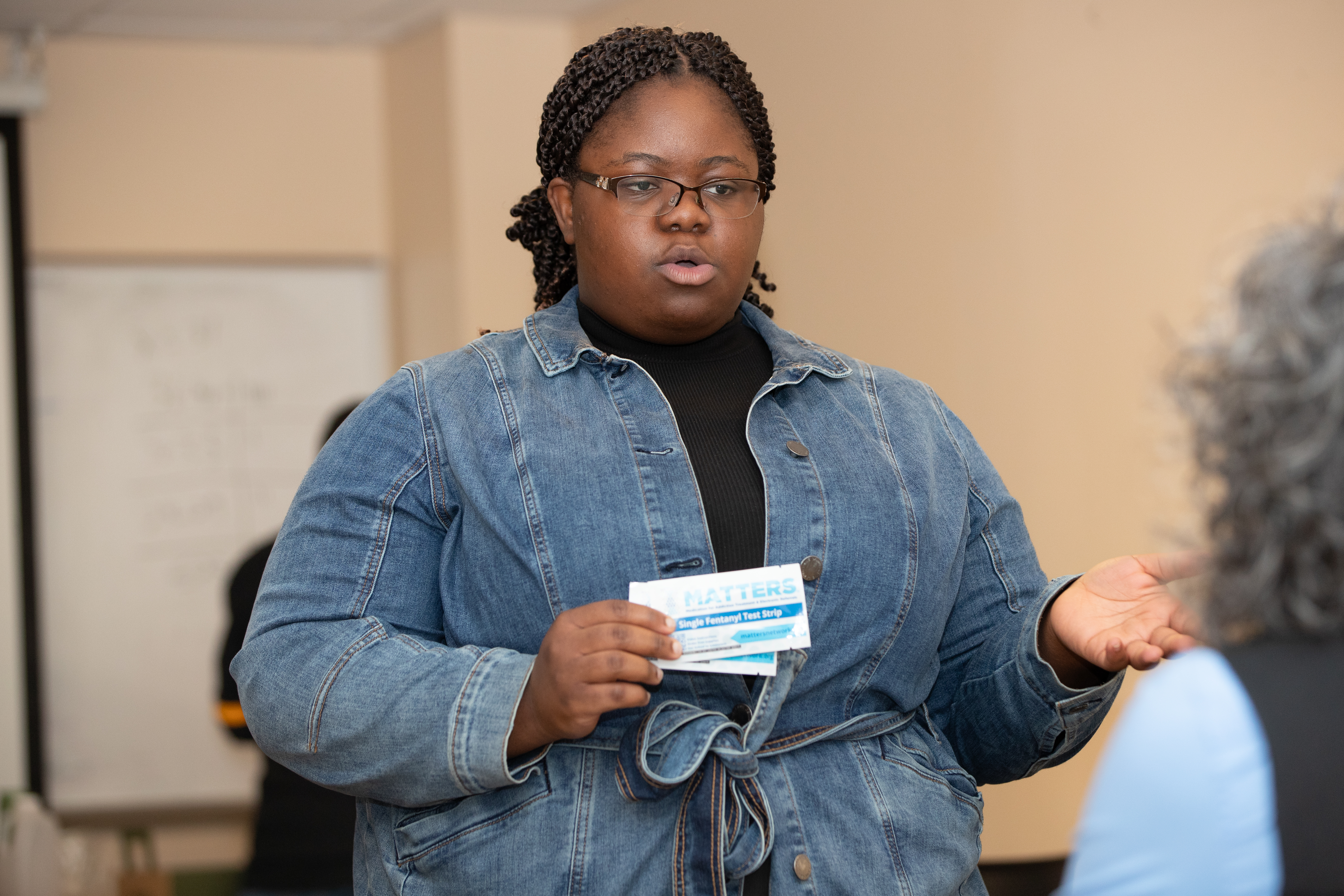 Pharmacy student Titilayo Sunday explains fentanyl and xylatine test strips