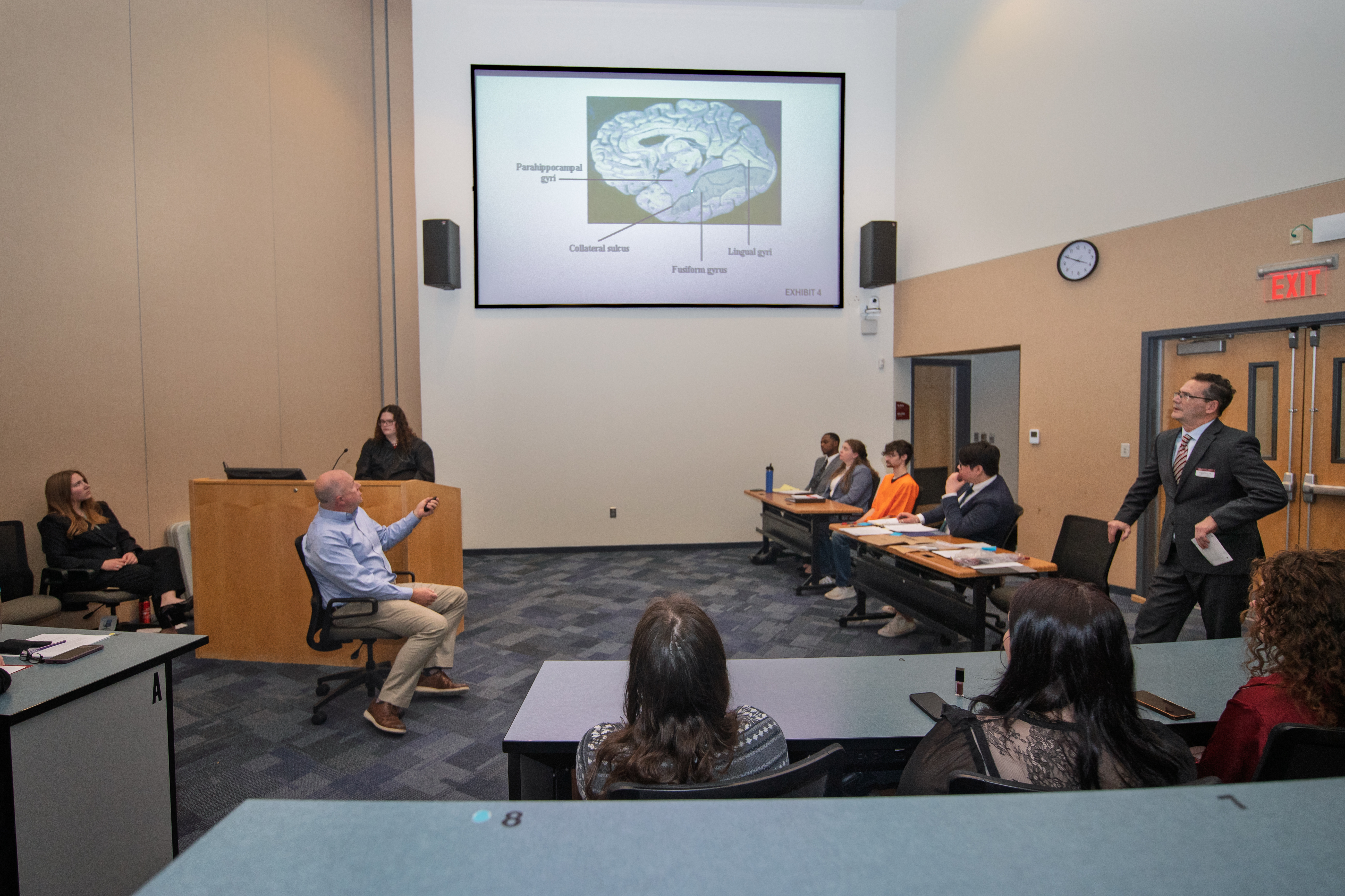 Assistant Professor Stephen Maher questions Professor Robert Flint during the mock case, People v. Innocent