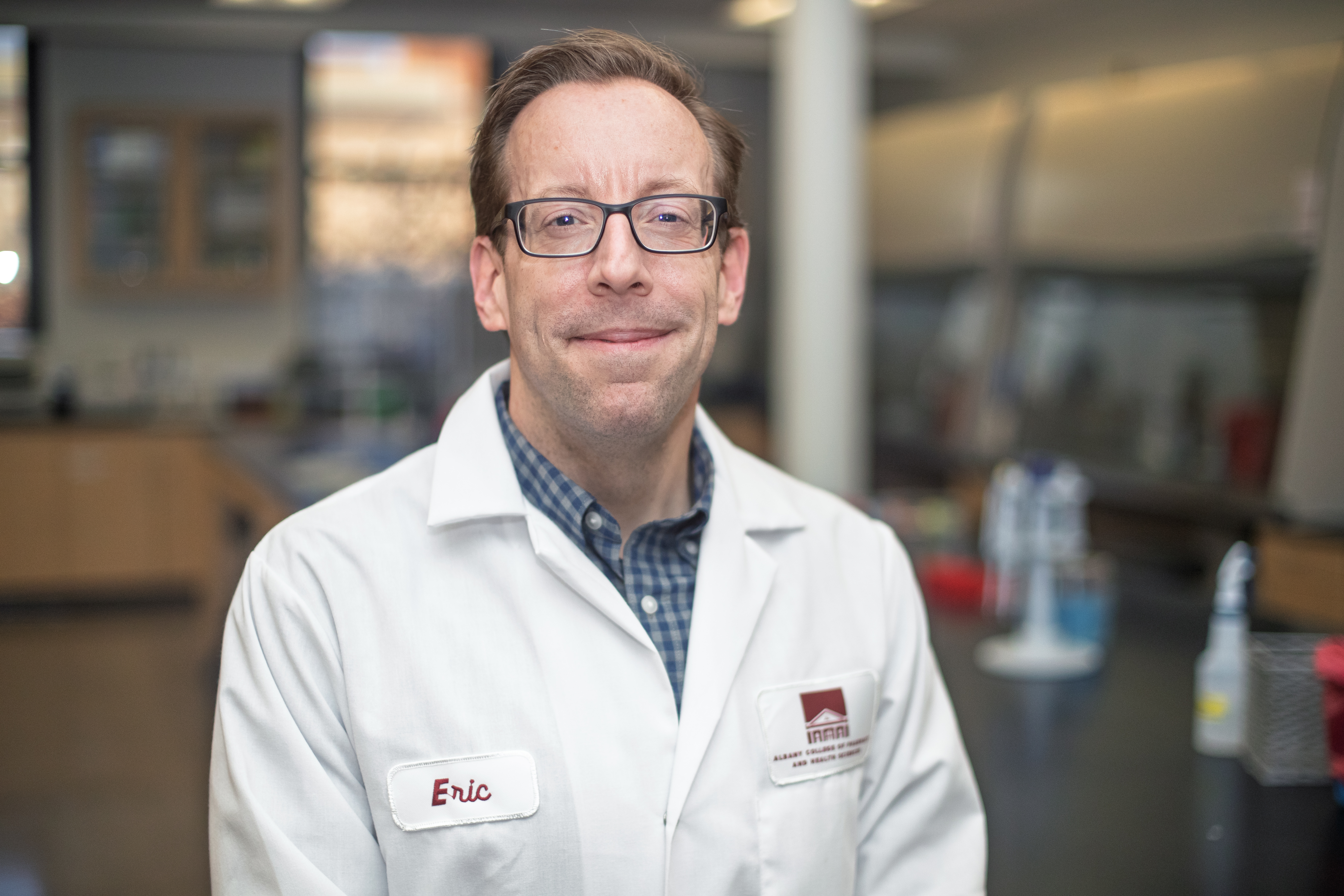 ACPHS' Dr. Eric Yager in the lab