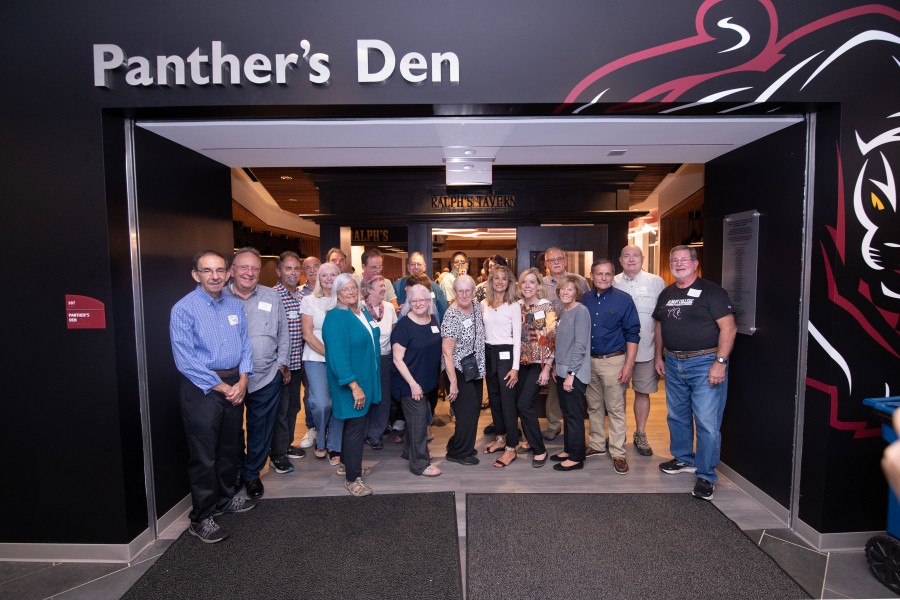 Alumni group gathers in front of Panther's Den entrance