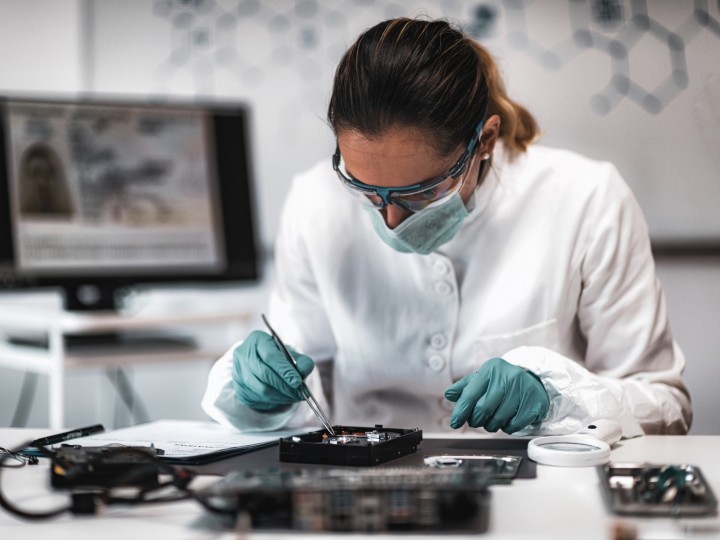 A student examines samples in research lab